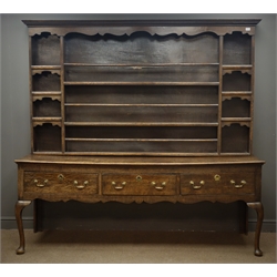  18th century oak dresser, projecting dentil cornice above shaped frieze, three tier plate rack with smaller shelves, base with three drawers on cabriole supports, W208cm, H195cm, D62cm  