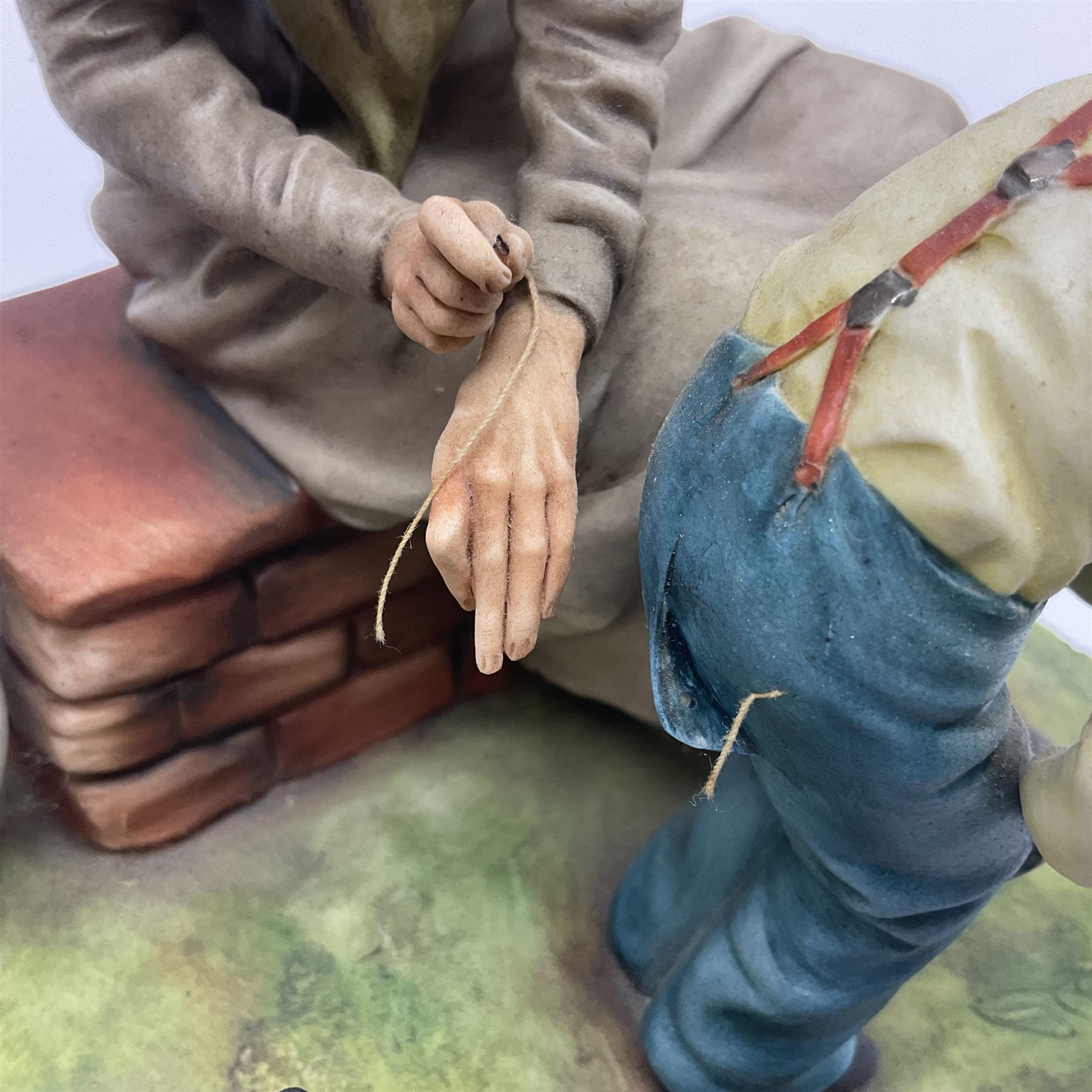 Capodimonte The Cheats, signed Zanella, together with another Capodimonte figure, H24cm  