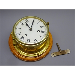  Schatz Royal Mariner brass cased bulkhead type clock, twin train movement striking the half hours on a bell, on wooden plaque, D23cm  