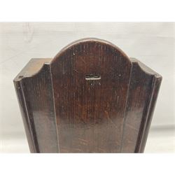 Georgian oak wall mounted candle box, of rectangular form with sliding cover inlaid with a lozenge, L40cm
