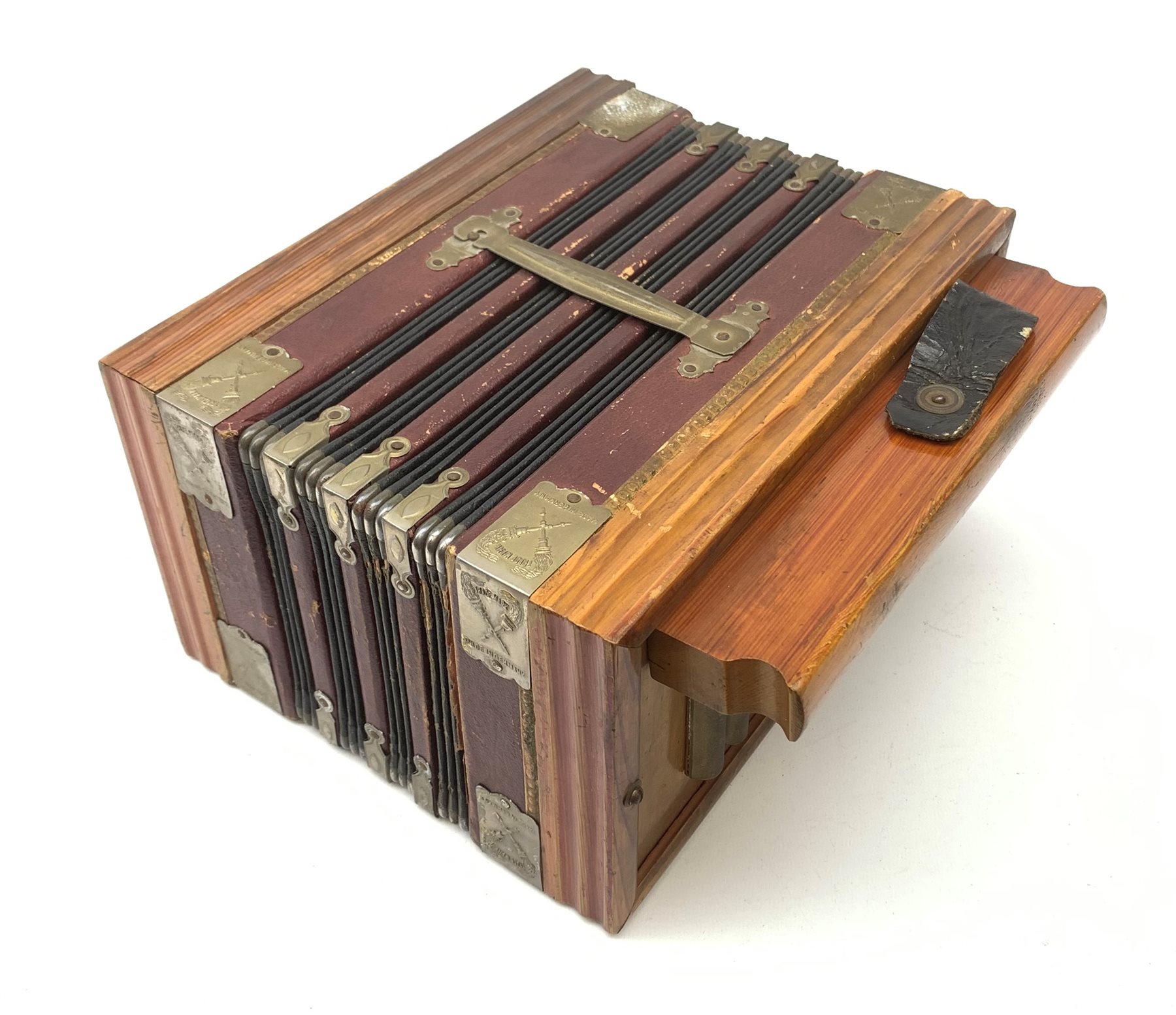 Early 20th century German tenbutton accordion with simulated wood