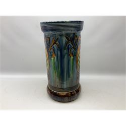 Majolica stick stand of cylindrical form in orange, green, blue and brown glaze, H53.5cm