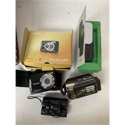 Canon Powershot A480 digital camera, in box, together with a Panasonic SDR-H86 digital video camera, Doro 5030 mobile phone, pair of Jessops Field Binoculars, two Weetabix diecast model cars, wicker picnic basket with plastic picnic ware and a collection of vinyl records