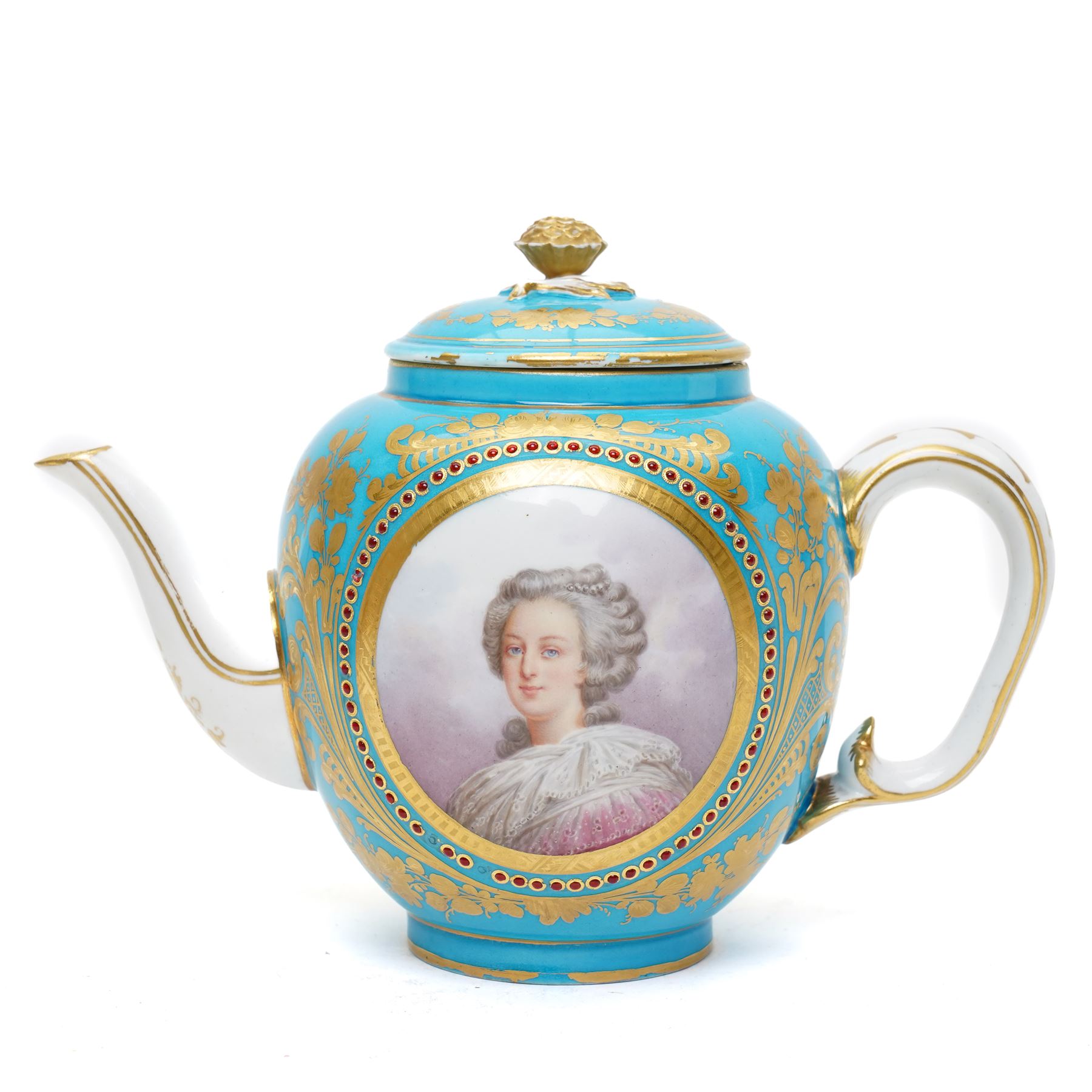 Sevres dejeuner 'Bleu turquoise' tea service for six covers, decorated by Charles-Eloi Asselin, comprising six teacups and saucers, teapot, milk jug and covered sucrier, the bleu de ciel ground painted with portraits of the French courtiers, each piece with name to base (some rubbed) of those depicted, to include Marie Antoinette (teapot), Madame de Montesson, Madame du Barry, Madam de Genlis, Madame Elizabeth (sucrier), Madame de Lamballe (milk jug) Madame Victoire, and two others unidentified, within finely painted gilt surround, each portrait encircled by red jewelled borders, the saucers with corresponding monograms within similar floral gilt and jewelled borders, Sevres mark to base with painted 'ee', dating these 1782, teapot H14cm 