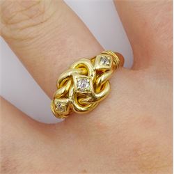 Edwardian 18ct gold three stone old cut diamond love knot ring, maker's mark EK, London 1903