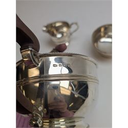 1930s silver three piece tea service, comprising teapot, milk jug and sugar bowl, each of circular form with oblique gadrooned rim, the teapot with Bakelite handle and finial, hallmarked Mappin & Webb Ltd, Birmingham 1931, teapot H14.5cm