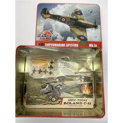 Seven plastic model construction kits - Airfix Vodaphone McLaren Mercedes racing car and Jaguar 'E' Type, Revell Ferrari F310B racing car and four tanks by Airfix, Revell and Tamiya; all boxed in factory sealed transparent packaging; together with an Airfix Spitfire kit tin, various model instruction sheets, catalogues and magazines.