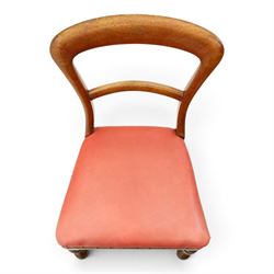Set of four Victorian mahogany balloon back chairs, with red leather seats 