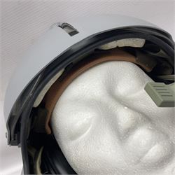 Silver grey SPH-4B Flight Helmet as used by helicopter pilots in the USAF and US Army in the 1990s; made of epoxy resin reinforced fibreglass; fitted with clear and tinted visors and complete with an M-87A/AIC boom mike; original condition and bench tested.