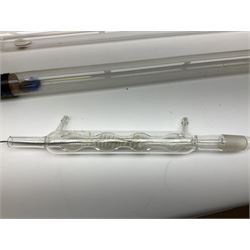 Quantity of laboratory and physics glassware including 'Guinea and Feather' equipment; boxed Latent Heat apparatus; Maltese Cross tube; atmospheric air pressure indicator flask; electroscope discharge tubes etc