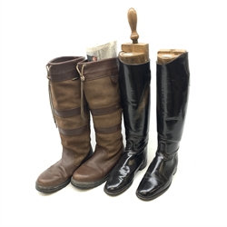 A pair of riding boots, together with a pair of Dubarry boots (size 9). 