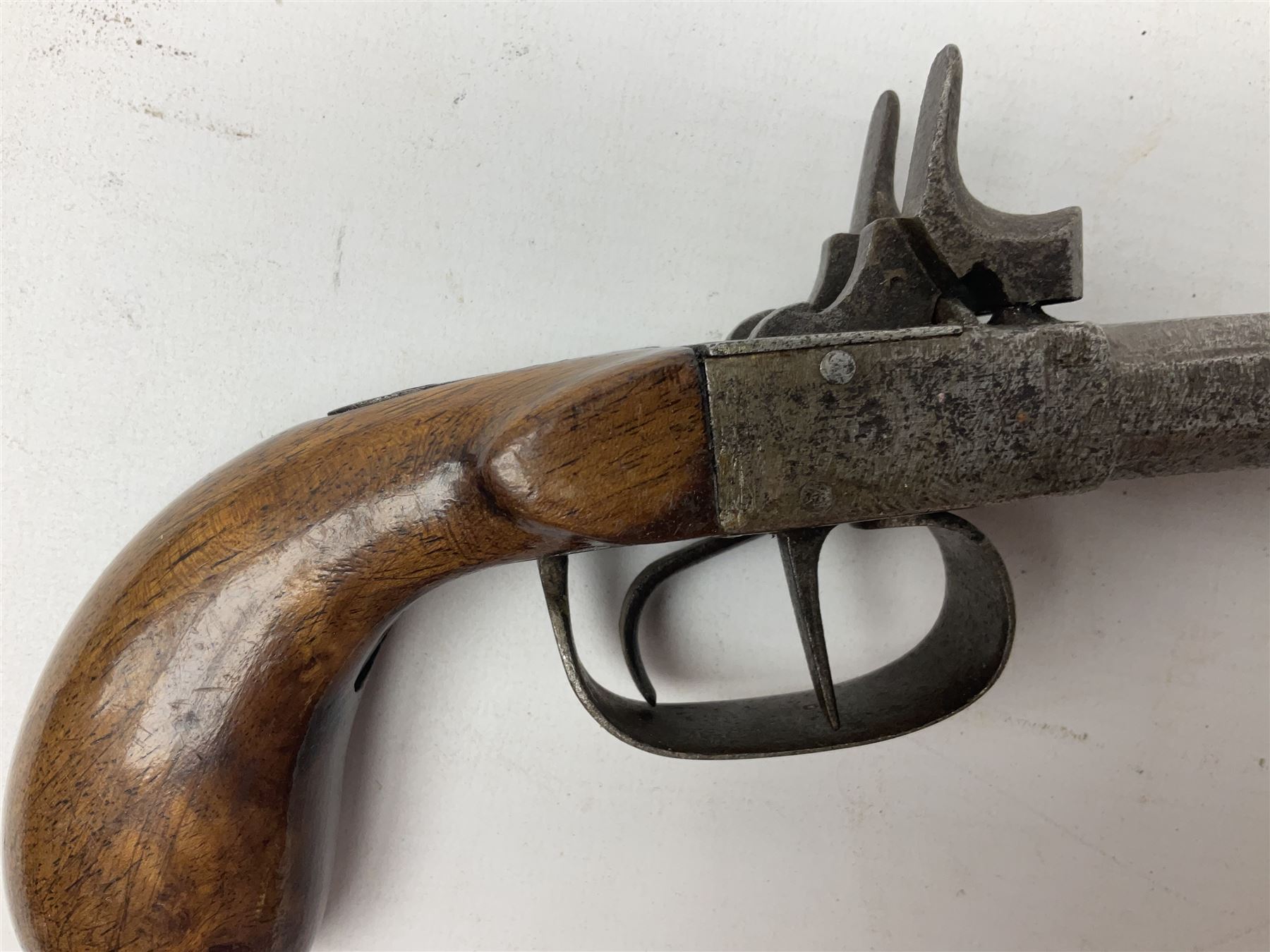 Mid 19th century double barrel percussion muff pistol, joined 7cm octagonal barrels with walnut stock19cm overall; a matching single barrel muff pistol 17cm overall (2)