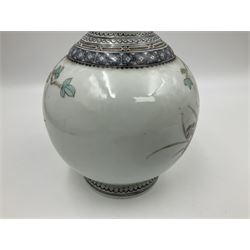 Pair of Chinese Republic porcelain vases, each painted in Famille Rose enamels with pairs of pigeons amidst peony, rock, flowering plants and leafy branches, possibly Qianlong seal beneath, H22cm 