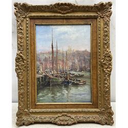 William Edward Webb (British 1862-1903): Fishing Boats in Whitby Harbour's Dock End, oil on canvas signed 34cm x 24cm