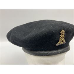 WW2 British black felt beret with Pioneer Corps cap badge, with Kangol Wear maker's mark dated 1943; and a British Army green webbing belt (2)