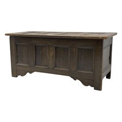 18th century design oak coffer, four panel hinged lid over four panel front, panelled sides, on stile supports with shaped brackets 