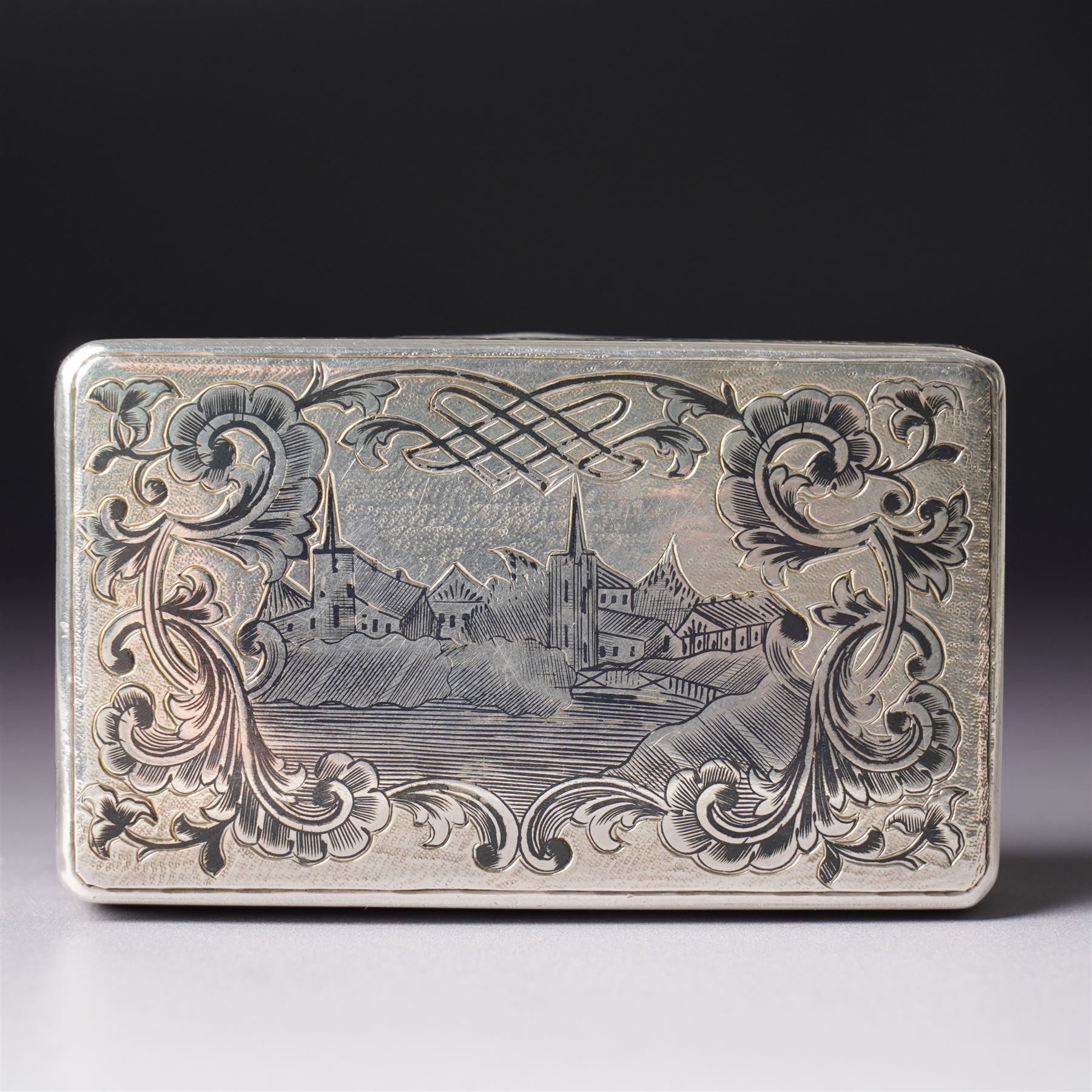 19th century Russian silver and niello work snuff box engraved with a view possibly of St Petersburg, Moscow assay, 84 standard