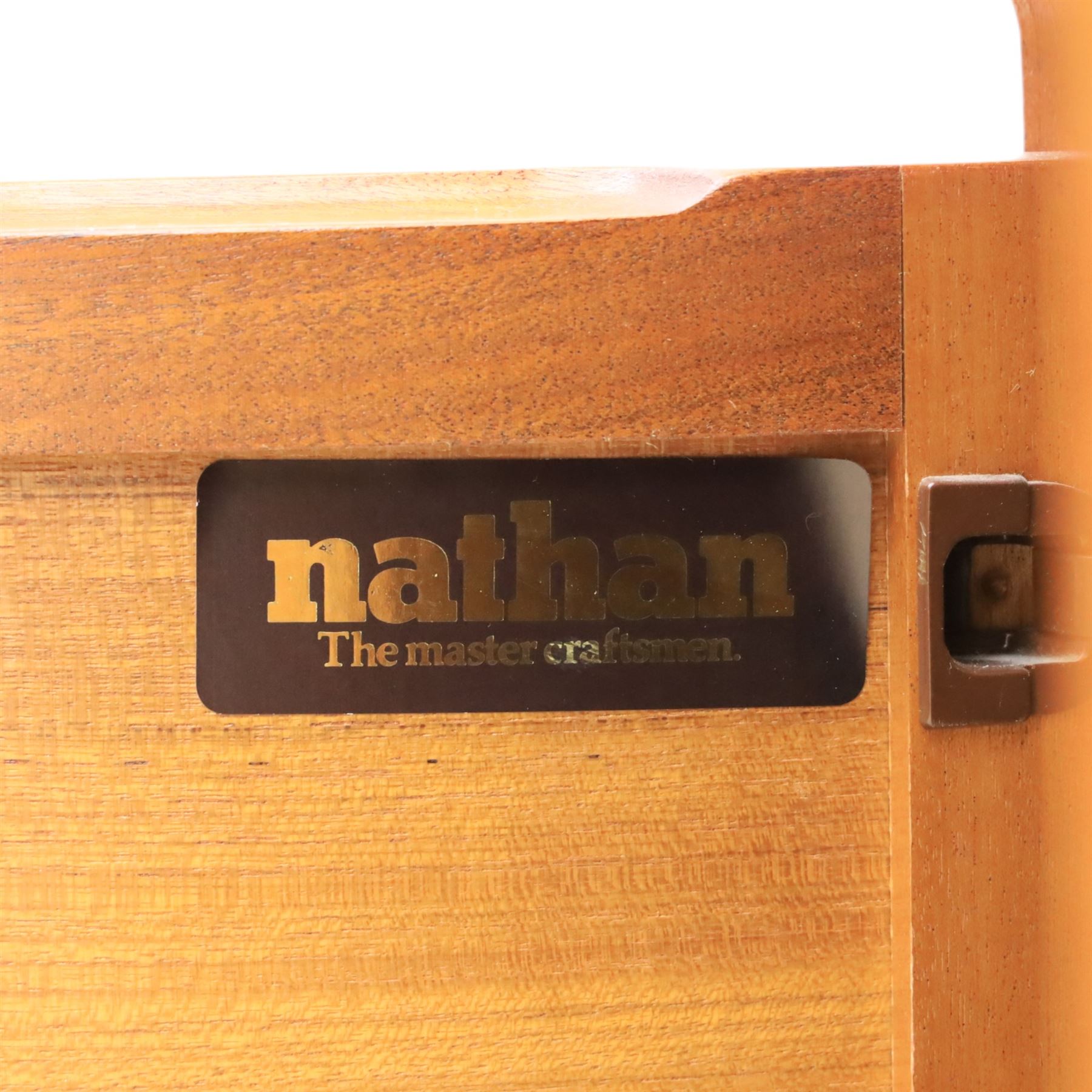 Nathan - concave corner cabinet, each of quarter round form with square top to fit against a wall, with open display compartment above a signature square panelled cupboard door, raised on a recessed plinth base