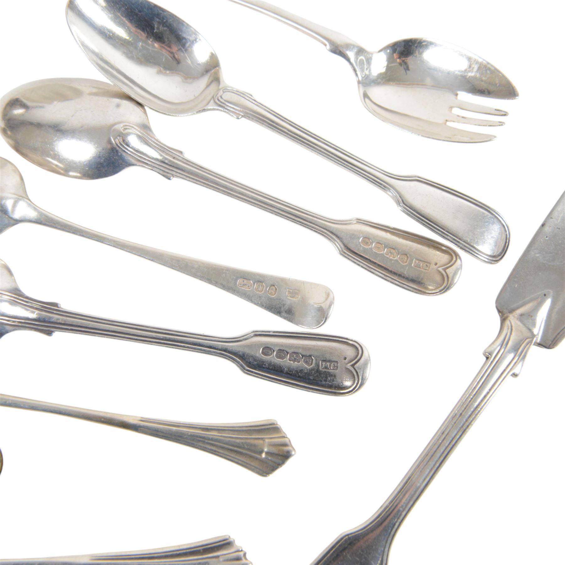 Collection of silver cutlery, including butter knife, apostle spoons, forks, etc, all hallmarked, together with Art Deco silver purse watch in green square shagreen case, silver mounted glass match striker, silver fruit knife with mother of pearl handle, silver mounted oval frame and a silver plated pencil