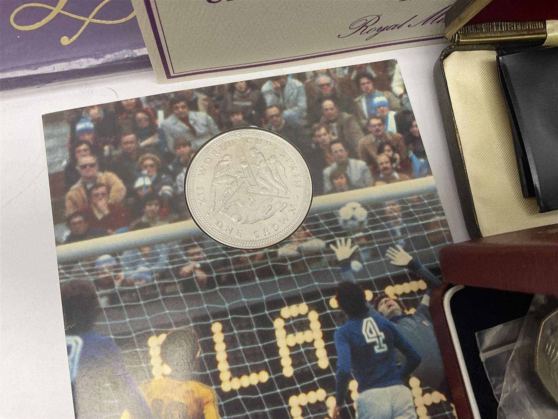 The Royal Mint United Kingdom 1983 proof coin collection in blue folder with certificate, 1983 uncirculated coin collection, two 1987 brilliant uncirculated coin collections, commemorative crowns etc