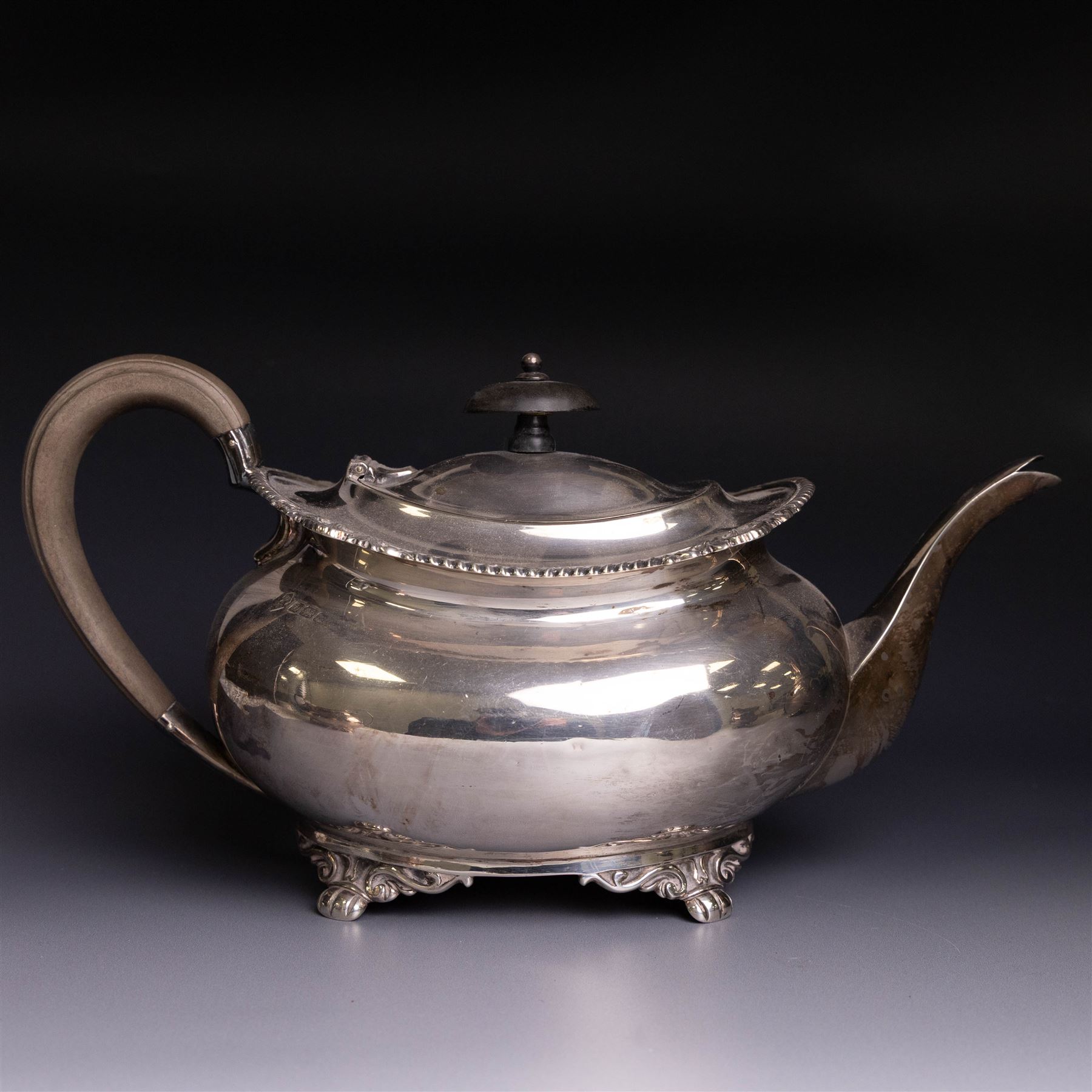 Victorian four piece silver tea service, comprising teapot, hot water pot, open sucrier and cream jug, each of baluster form and decorated with a frieze of neo-classical figures on a textured ground, the teapot and hot water pot with Roman helmet finials and ivory insulated handles, Roberts & Belk, Sheffield 1872, tallest including handle H32cm