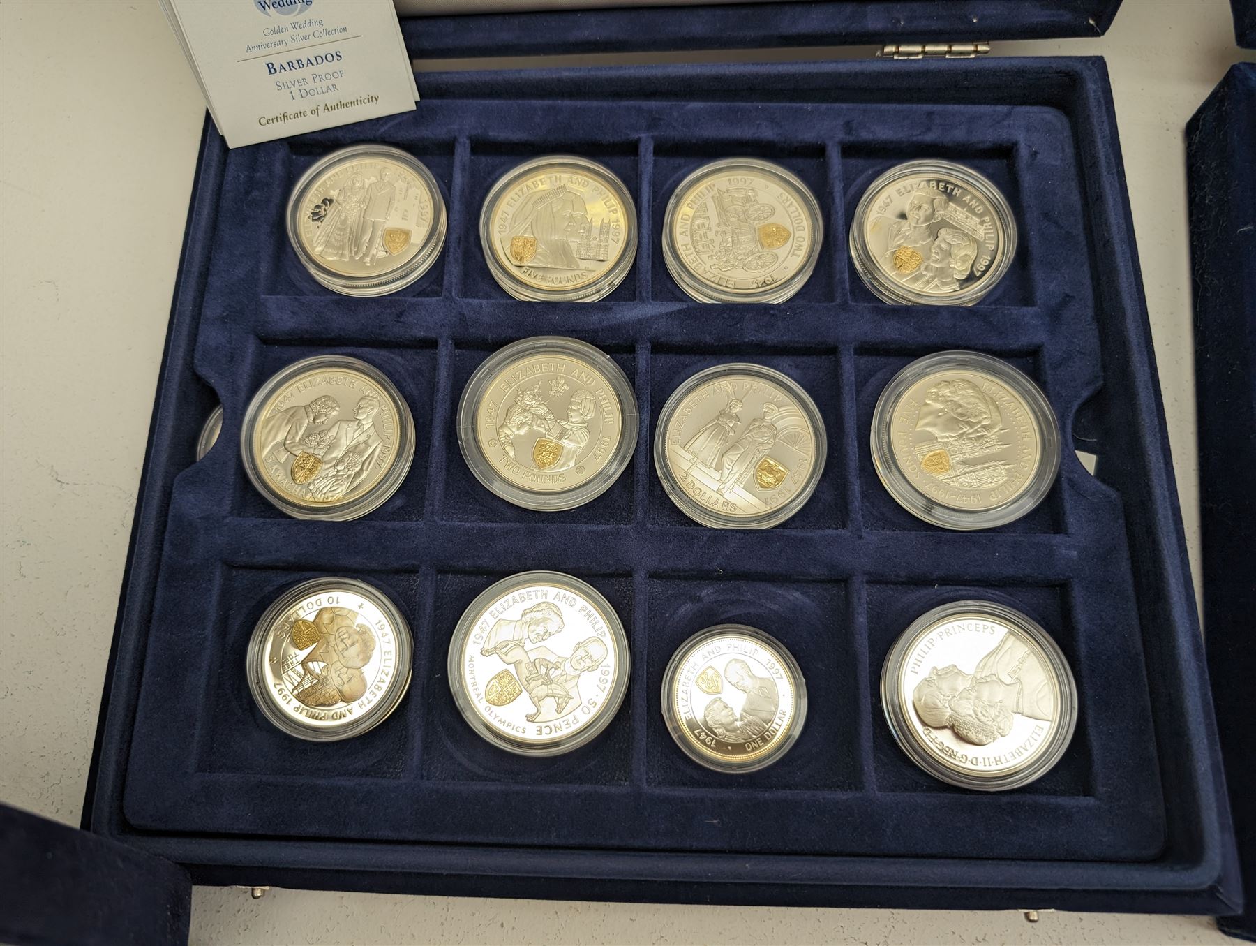 Large collection of modern commemorative coins, mostly being silver proof, including Queen Elizabeth II Bailiwick of Guernsey 1999 'Sir Winston Churchill' one pound, 2000 'HM Queen Elizabeth The Queen Mother', various sterling silver proof coins from the 'Golden Wedding Anniversary Silver Collection' including Bailiwick of Guernsey 1997 five pounds, Bermuda 1997 two dollars, Republic of Malawi 1997 five kwacha, Falkland Islands 1997 five pounds, Bailiwick of Jersey 1997 five pounds, Alderney 1997 two pounds etc, various sterling silver proof and portrait highlighted in gold coins from the 'Golden Jubilee Collection' including Cayman Islands 2002 two dollars, Bailiwick of Guernsey 2003 five pounds etc, housed in various coin displays or cases, mostly with certificates