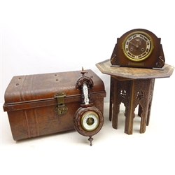  Anglo-Indian heavily carved hardwood table, metal trunk, mantle clock with English movement and barometer (4)  