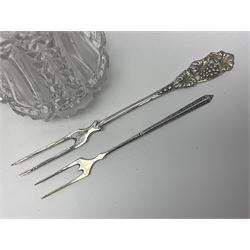 Early 20th century cut glass silver sugar caster, hallmarked C B Thomas & Co, Birmingham 1910, together with silver pepper, hallmarked, a continental silver pickle fork, stamped 800 and a plated cake fork