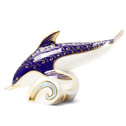 Moorcroft 'Wind of Change' pattern vase H13cm, boxed, Royal Crown Derby 'Striped Dolphin' limited edition paperweight 1166/1500, boxed and with certificate and another Dolphin paperweight, boxed and both with gold stoppers (3)  