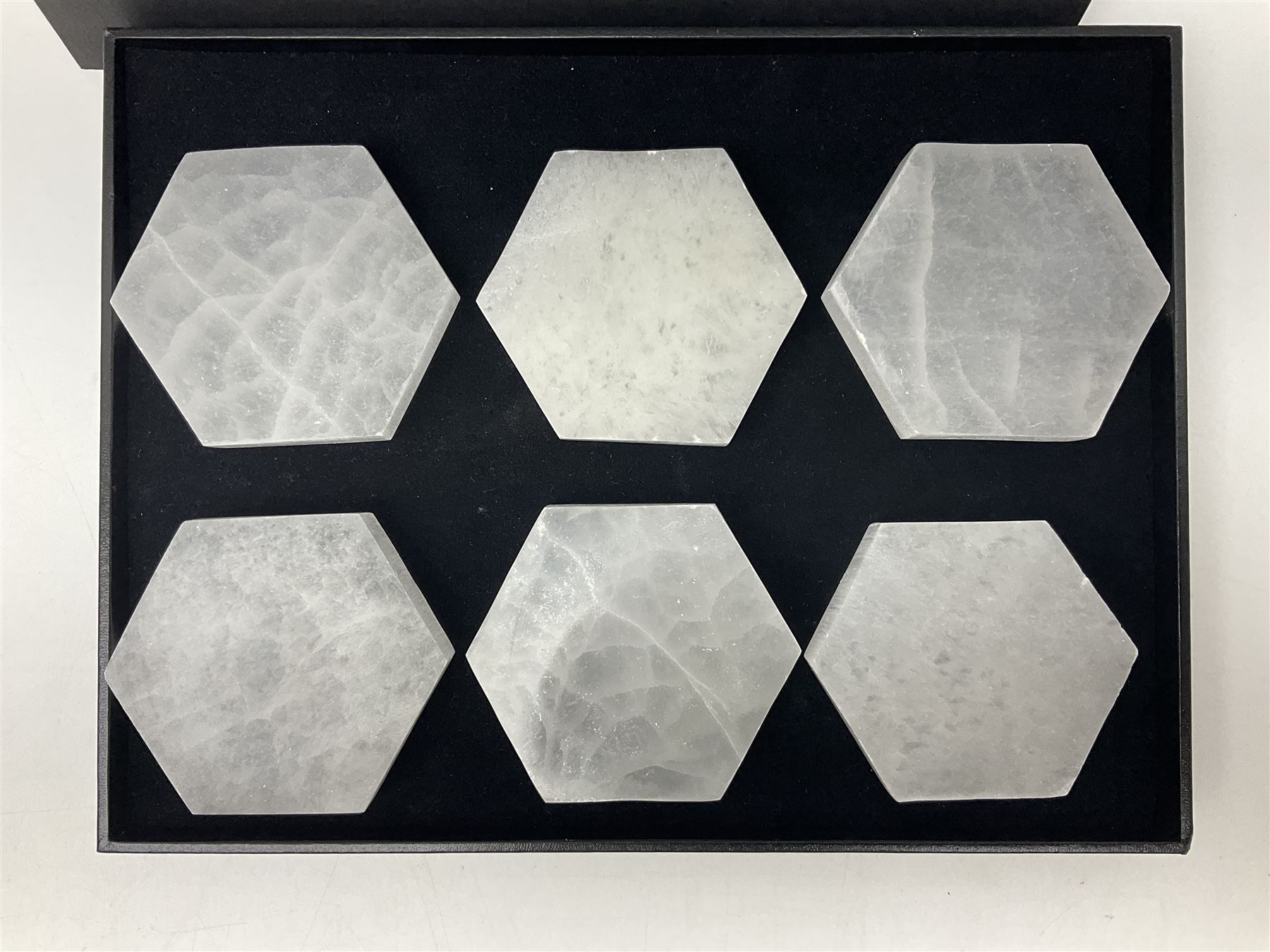 Set of six selenite hexagonal coasters, D7cm