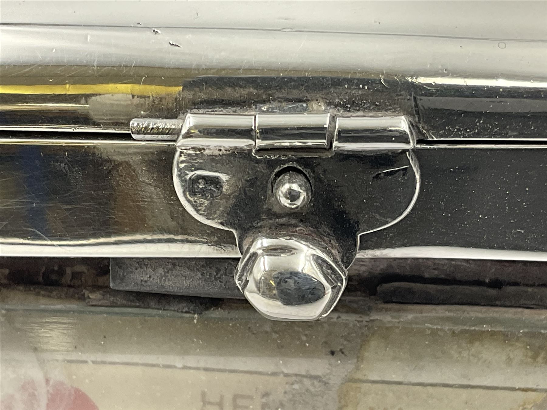 Edwardian silver mounted playing card case, hallmarked William Harrison Walter, Birmingham 1903, the sides each with a period playing card set behind a bevelled glass panel, the hinged cover with later engraving 'Presented to Norman T Crombie Esq by the officers & men of the 31st WR Detachment for services rendered 1917-1918', with red leather lined interior, the three compartments upon a sprung base and containing two later wooden Whist markers, case H12.5cm