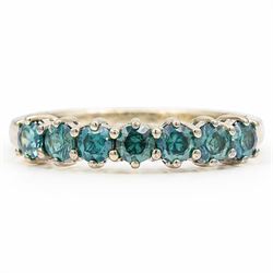 14ct white gold fancy blue diamond ring, set with seven round brilliant cut diamonds, stam...