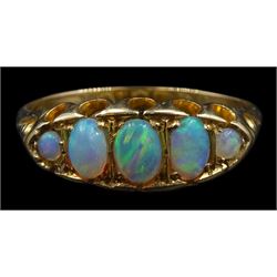 Early 20th century 18ct gold graduating opal ring, hallmarked