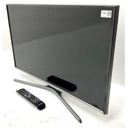 Samsung UE32J5500AK television with remote control 