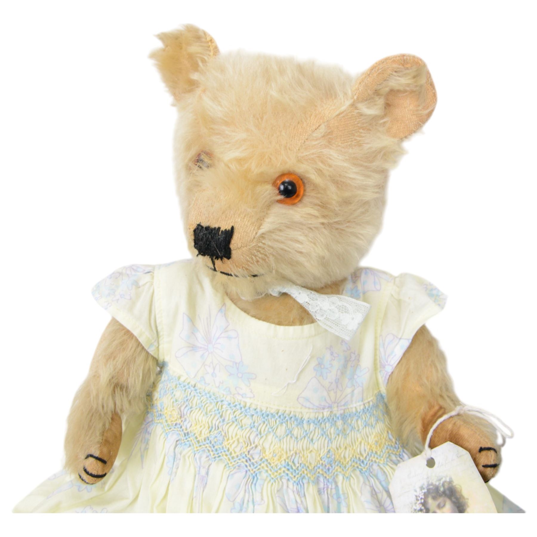 Eight early 20th century and later teddy bears, to include three straw filled examples with jointed limbs, tallest H58cm