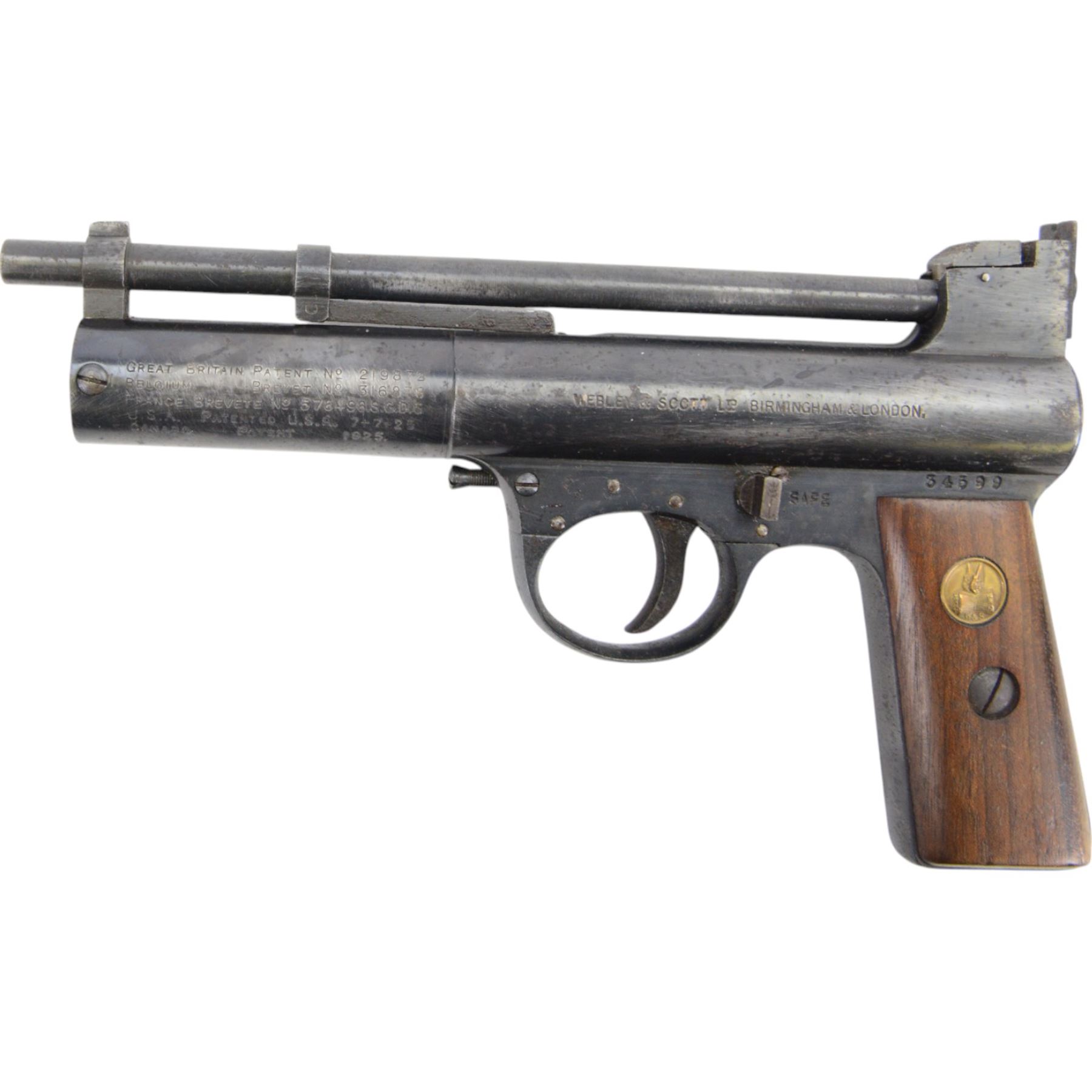 Webley Mark I .177 air pistol, circa 1924, serial number 34599, the air chamber marked Webley Air Pistol Mark I, Webley & Scott Ltd. Birmingham & London, with logo inset to the wooden grips, H13cm, L20cm