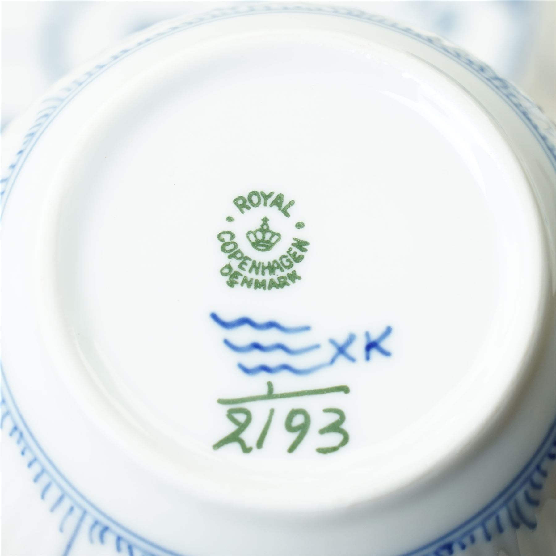 Royal Copenhagen onion pattern low comport, three breakfast cups and five saucers, oval platter, four tea plates, Munich 1972 Olympics plate, and four other blue and white items