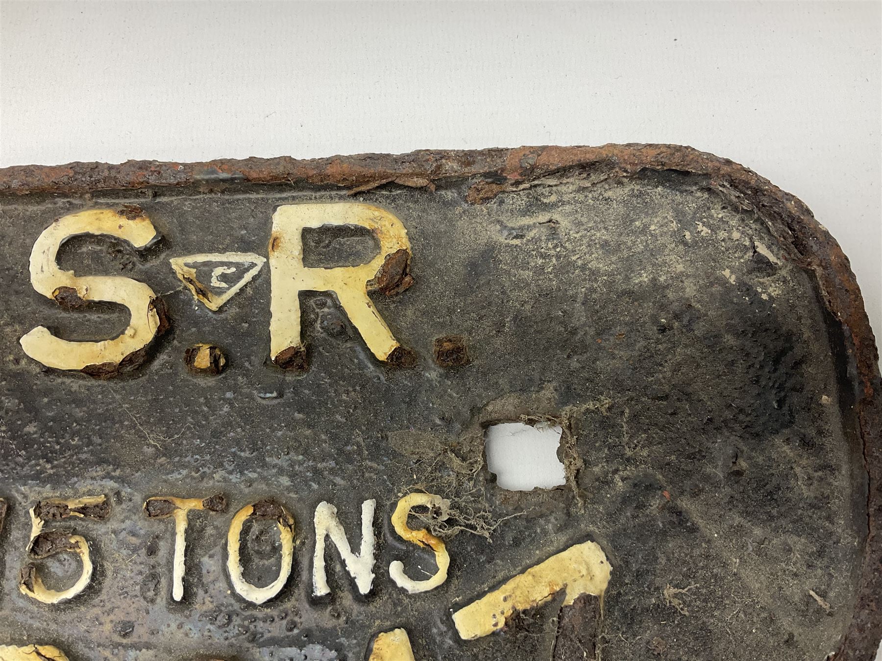Three cast iron railway wagon plates of D shaped form to include Southern Railway, LMS and GWR, L27.5cm