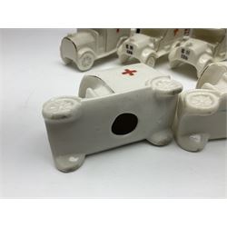 Ten WW1 crested china military models comprising seven field ambulances and three 'Home Fires Burning' fire-surrounds/range; various makers including Willow Art, Arcadian China, Grafton China, Savoy China, Carlton China etc; various crests including Devon, Aldershot, Portsmouth, West Ham, Coventry, Oxford, Hastings, Brighton etc (10)