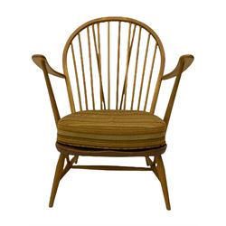 Mid-20th century Ercol light elm and beech hoop and stick back easy chair, with upholstered loose seat cushion in striped fabric