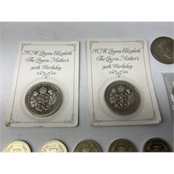 Five Queen Elizabeth II five pound coins including two 1990 on cards and seventeen two pound coins, various dates