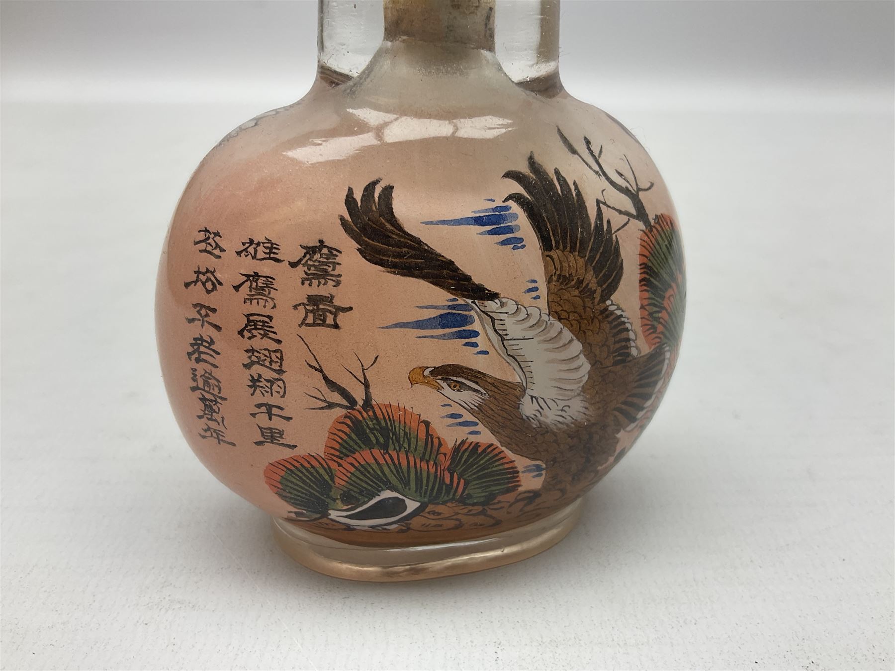 Seven Chinese glass snuff bottles painted with figures and animals, together with three wood mounted bone examples