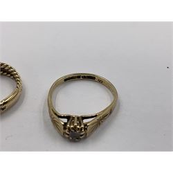 Four 9ct gold rings, to include cubic zirconia wishbone ring, single stone cubic zirconia ring and two heart design signet rings