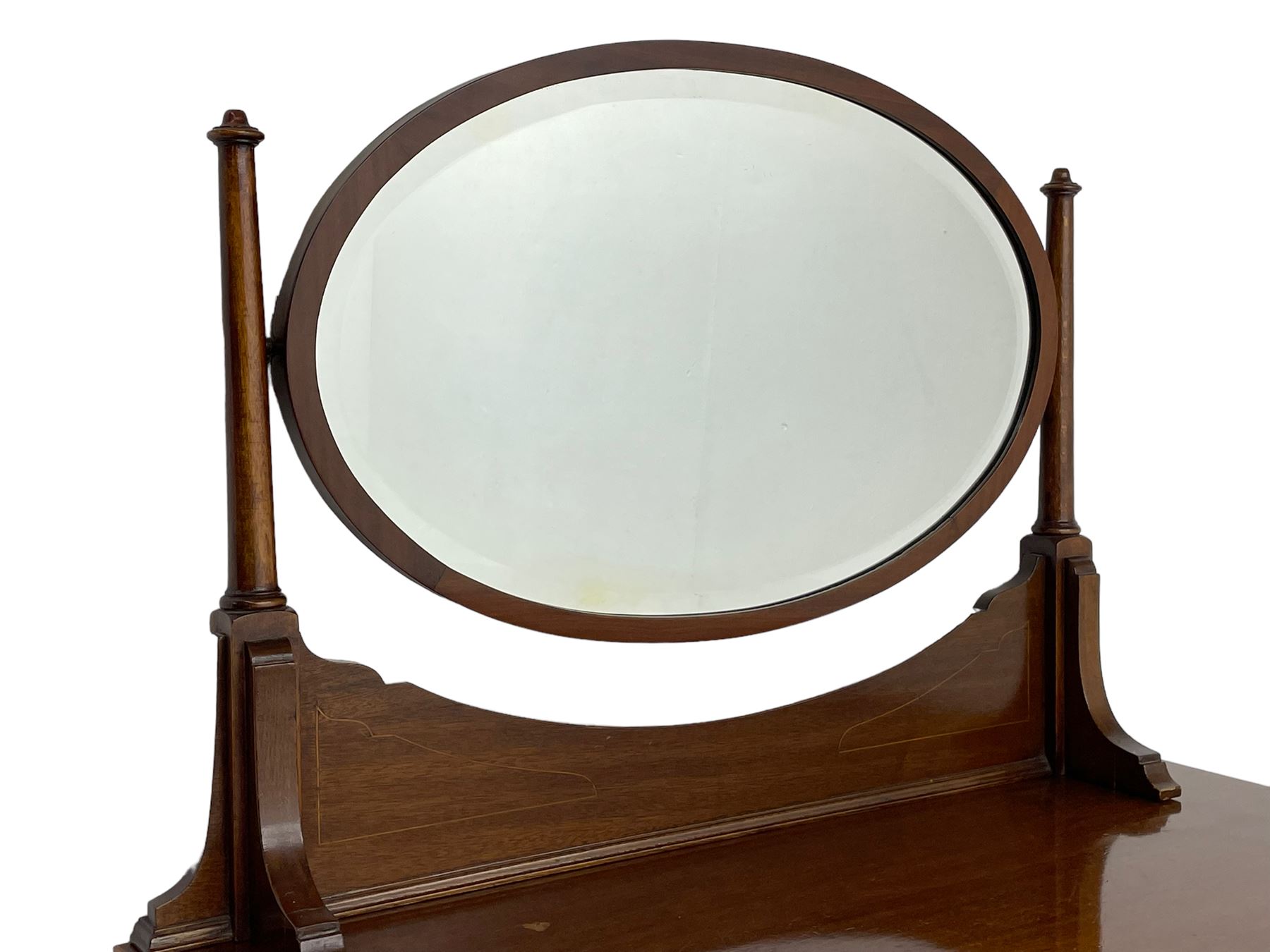 George III design mahogany straight-front chest, raised oval swing mirror with bevelled glass on turned supports, fitted with five graduating drawers with boxwood stringing, on bracket feet