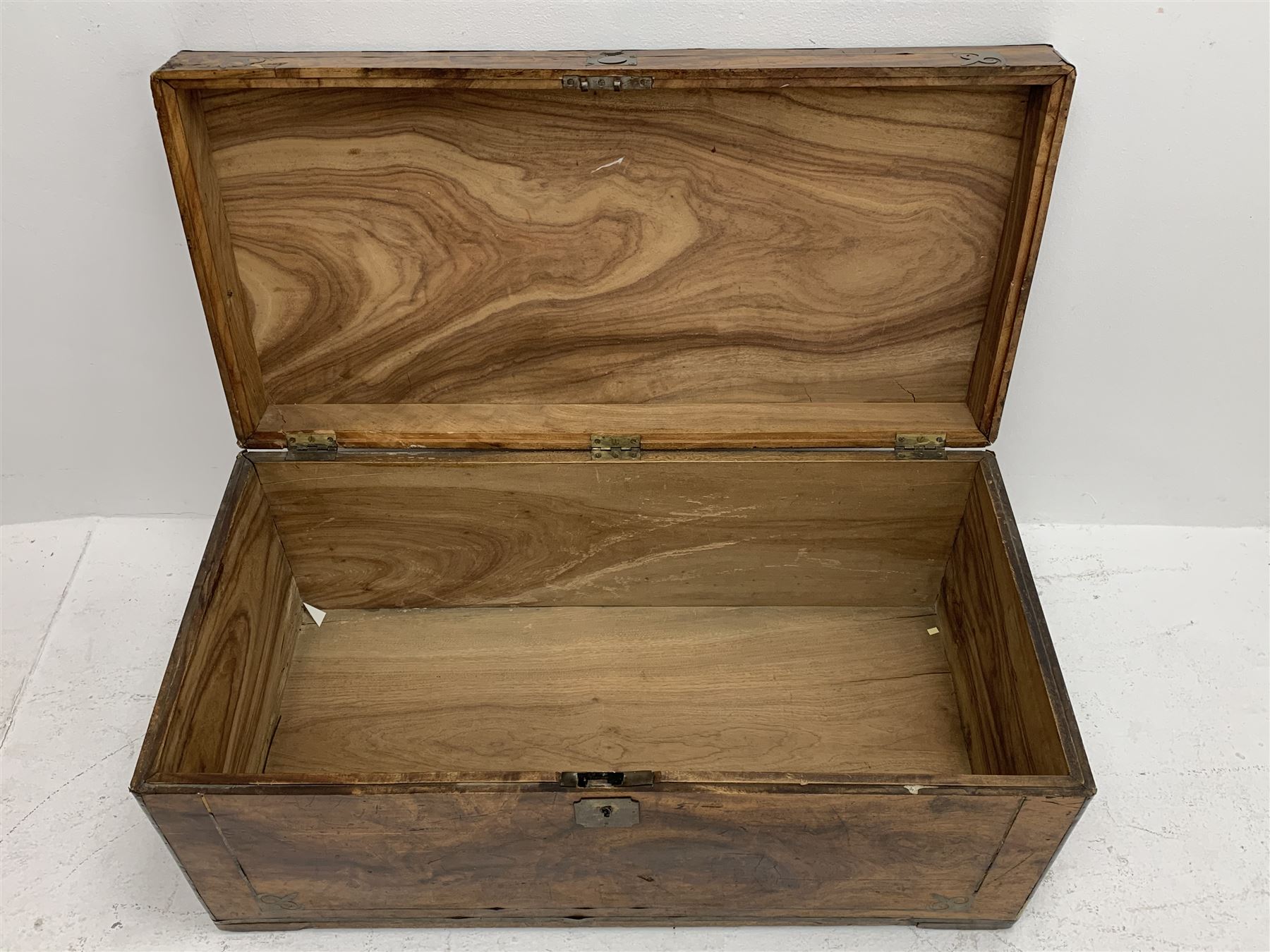 19th century brass bound camphor wood campaign chest, with decorative brass inlays and carrying handles, W91cm, H41cm, D46cm