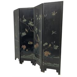 Chinese four-panel folding room screen, black lacquered with a naturalistic scene decorated with trees, birds and flowers