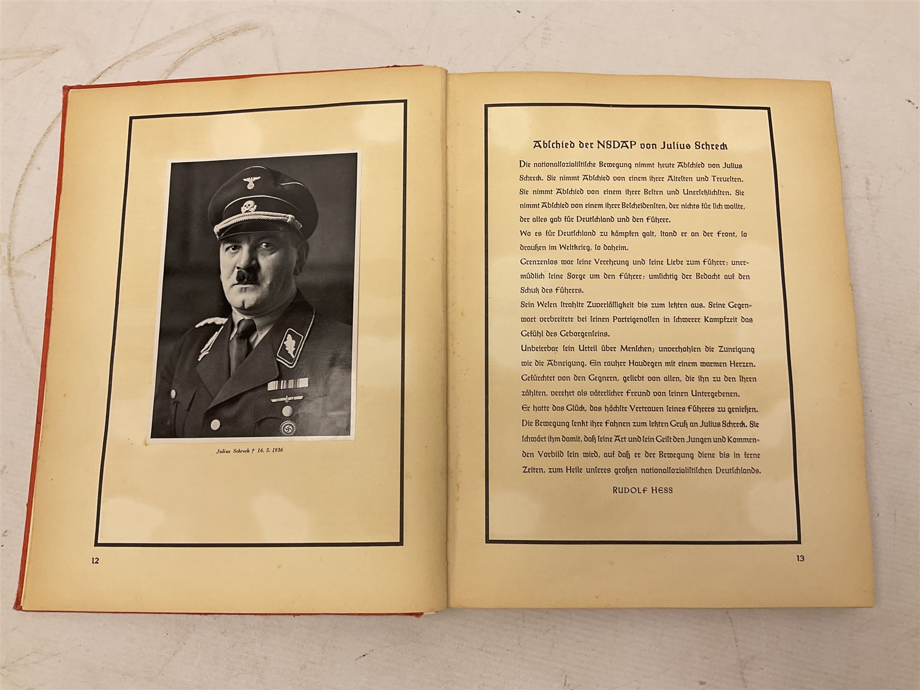 Adolf Hitler, Bilder aus dem Leben des Fuhrers [Pictures from the Life of the Fuhrer], Herausgegeben vom Cigaretten / Bilderdienst, Hamburg / Bahrenfeld, 1936, an album of two hundred tipped-in cards bearing photographs by Heinrich Hoffman, originally collected with cigarettes, 31 cm x 24 cm; together with a Waffen-SS book 'Wenn alle Bruder schweigen'; Hamburg 1939-1945; and two other booklets