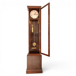 Edwardian mahogany regulator longcase clock, retailed by Maple & Co. Ltd., London, moulded cornice over glazed case enclosing a circular painted Roman numeral dial, single train weight-driven movement with brass cased weight and pendulum, on plinth base