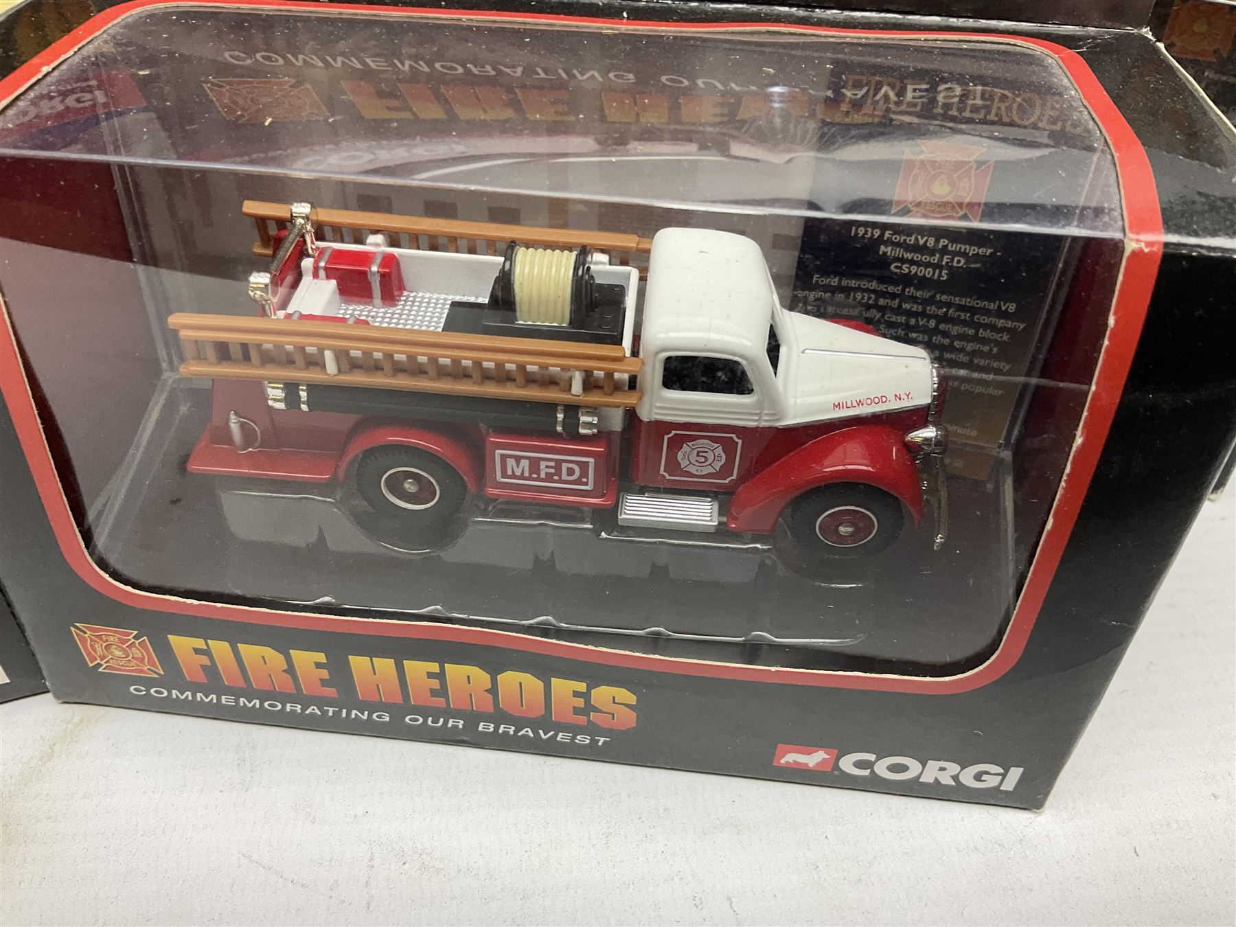 Corgi - eleven fire-fighting vehicles comprising limited edition 54706 E1 Side Mount Washington DC and 54902 E1 75ft Ladder Duncan Fire Department; 97392 Simon/Dennis Hydraulic Platform; 97361 AEC Turntable Ladder;  and seven 'Fire Heroes'; all boxed (11)