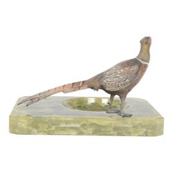 After Franz Bergman, 20th century cold painted bronze, of a pheasant, mounted on an onyx ashtray, H13cm, L22cm
